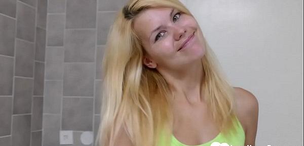  Busty blonde masturbates while in the bathroom